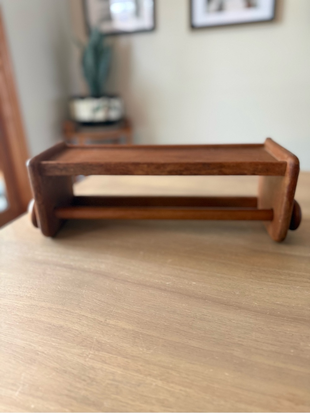 Vintage wooden shelf with towel holder